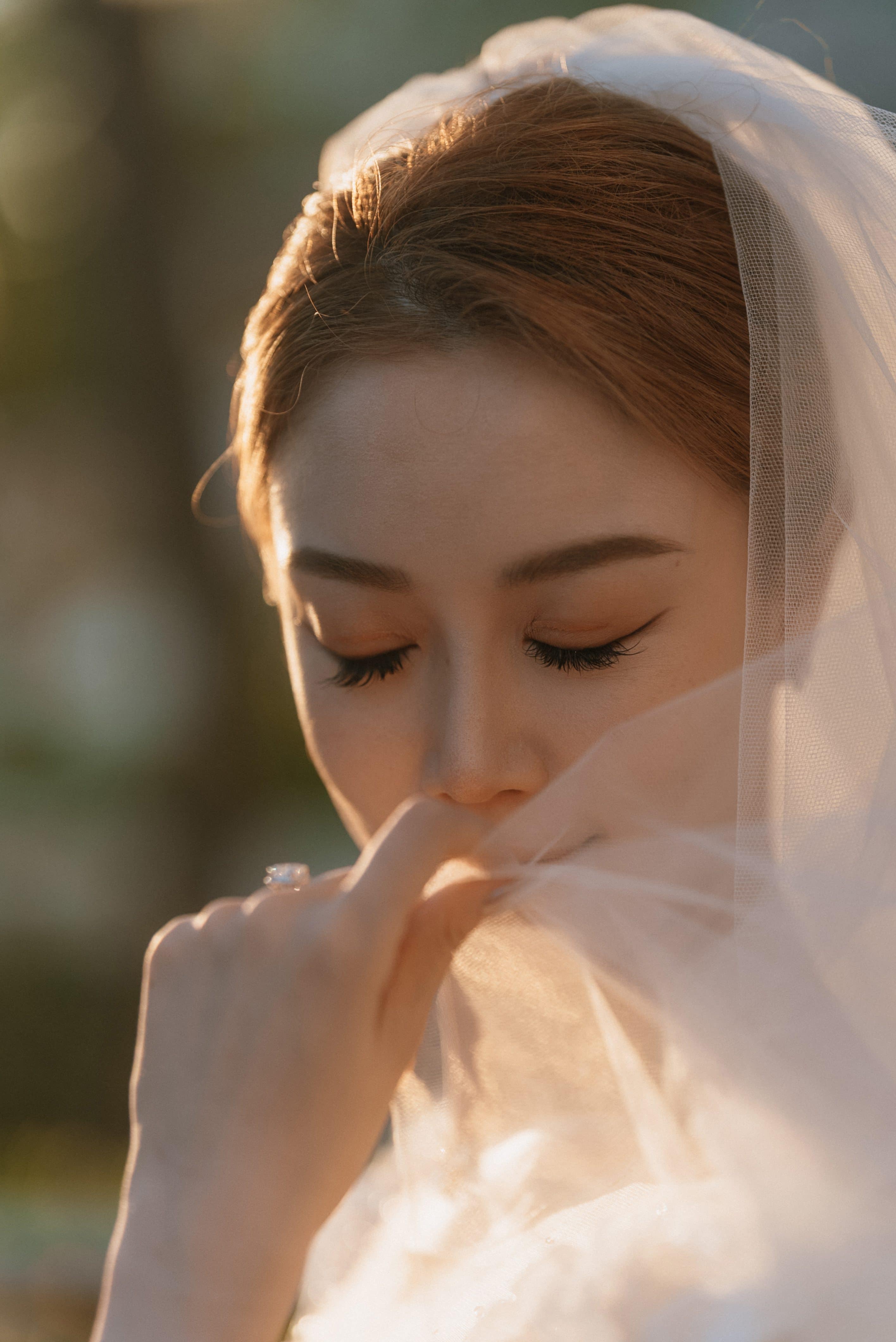 Foreign couple celebrating their destination wedding at a Bali venue in warm afternoon light