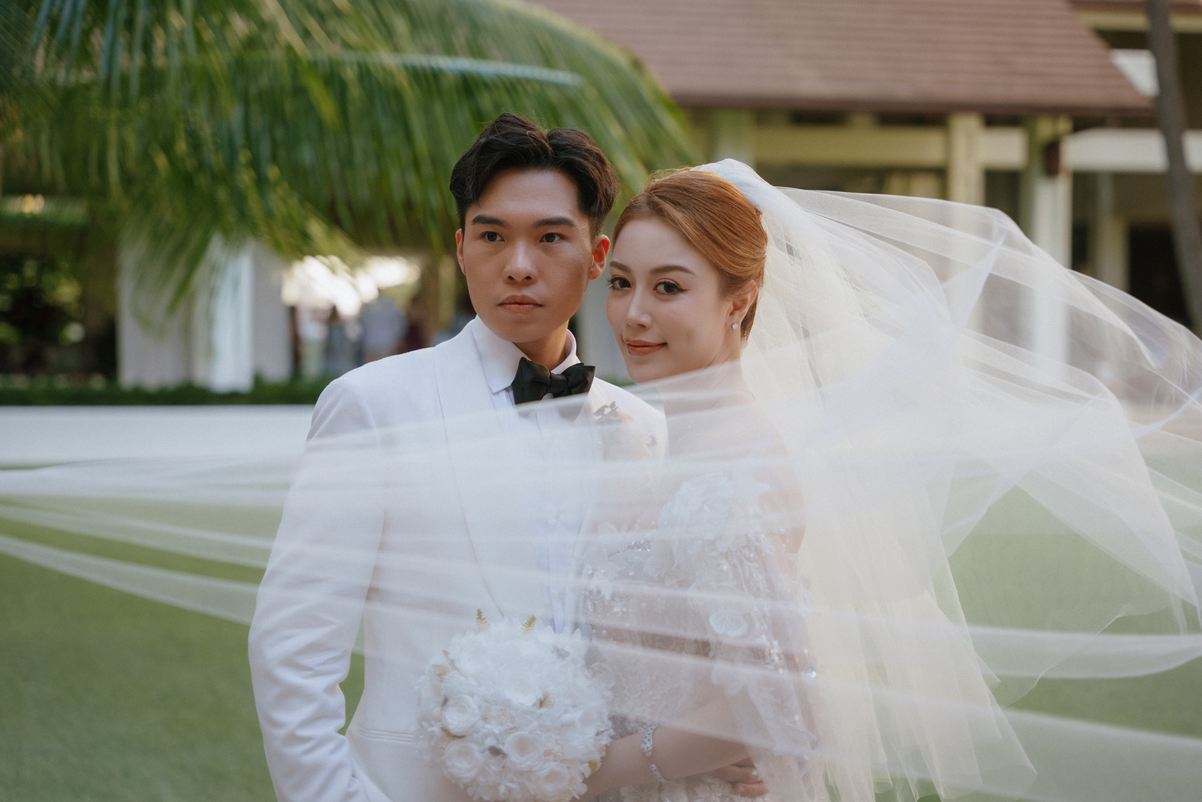 Couple portrait with a flowing veil at The Royal Pita Maha, Ubud